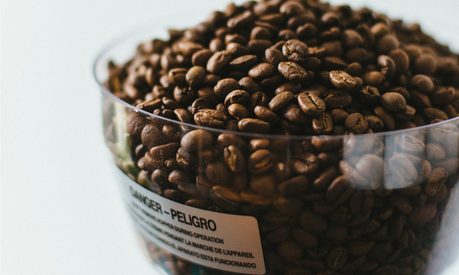 How should I store coffee beans at home?