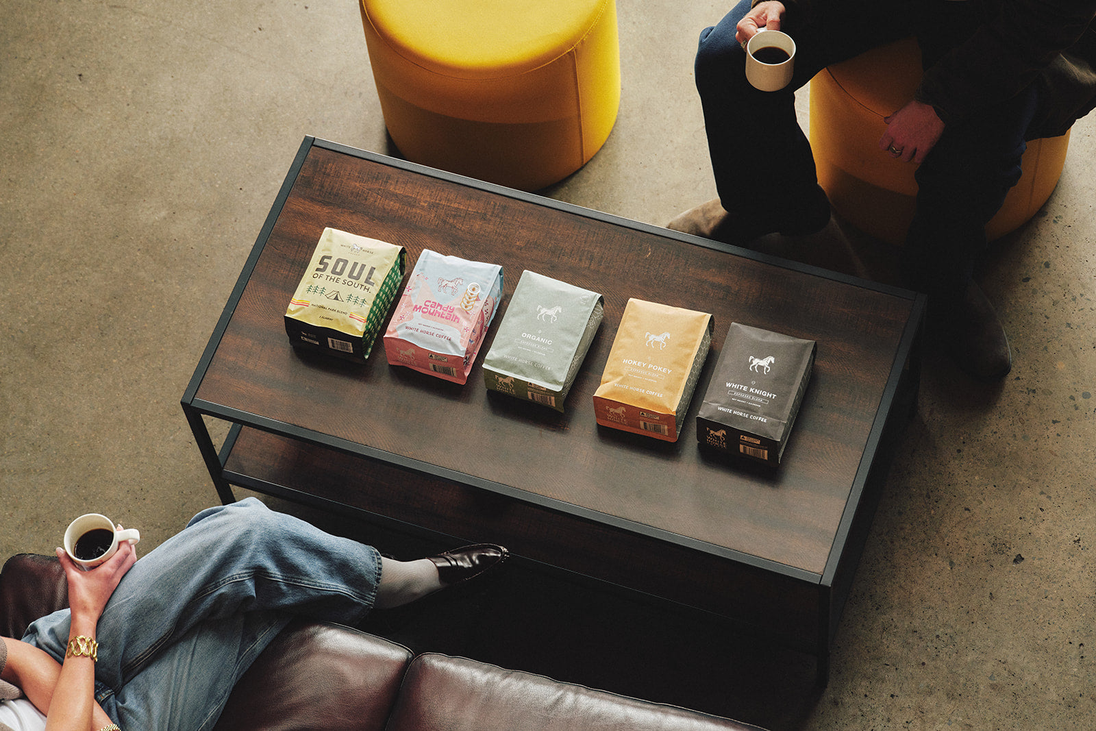 Assorted bags of coffee blends in various colours