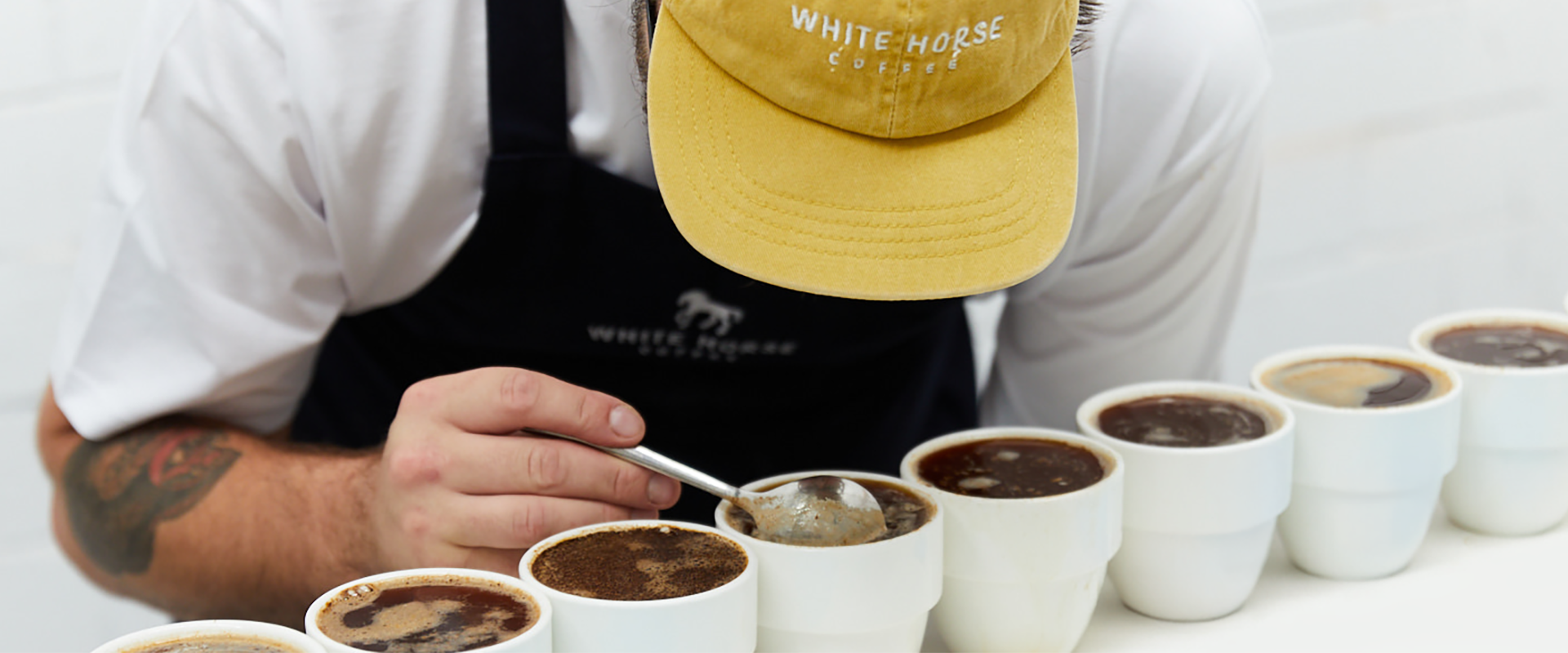 Boxes of White Horse Coffee's various blends